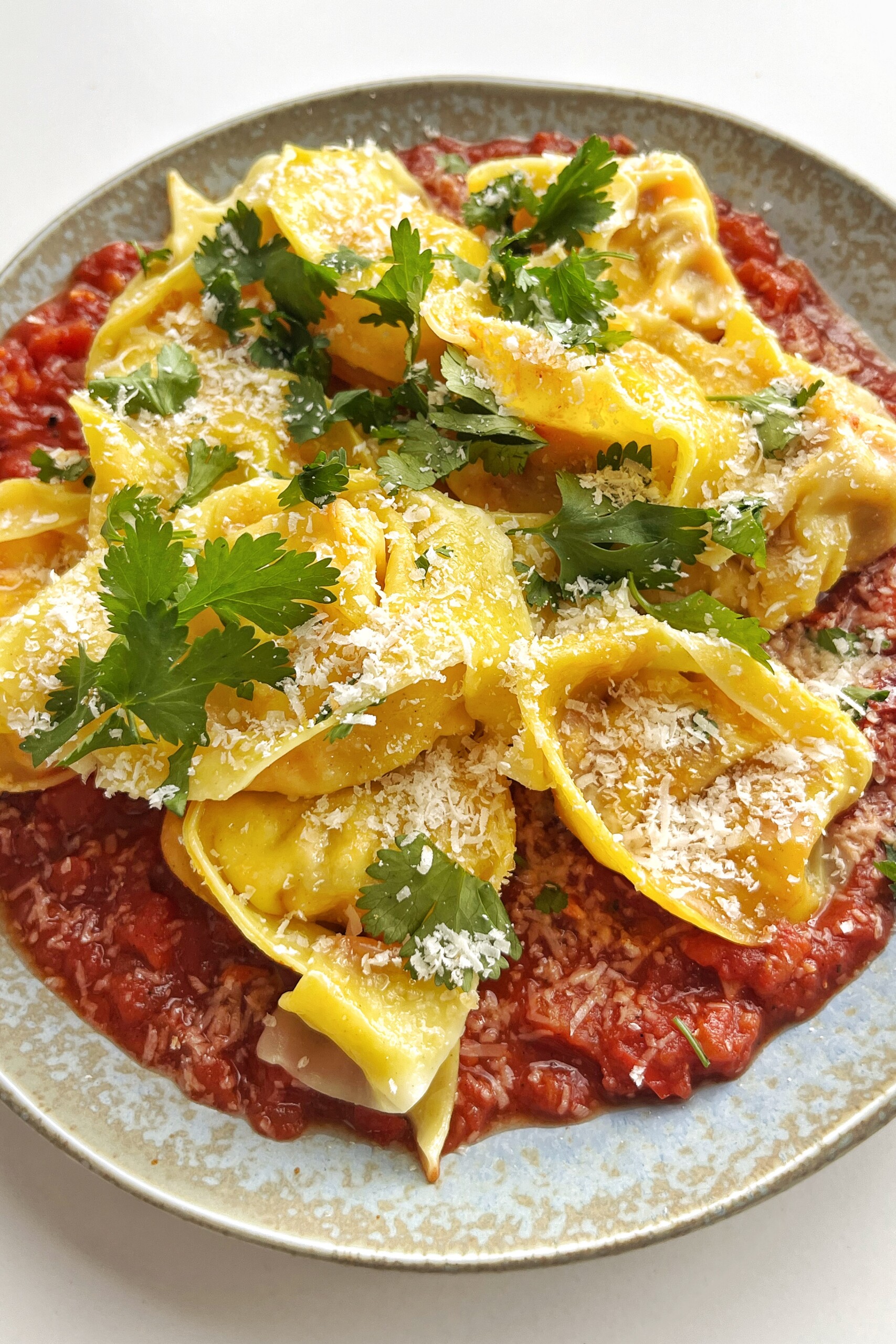 Dumplings on a tomato sauce.