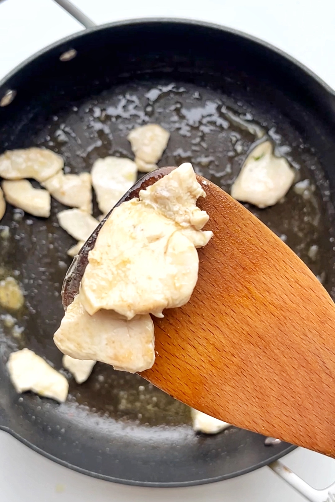 Pan frying chicken.