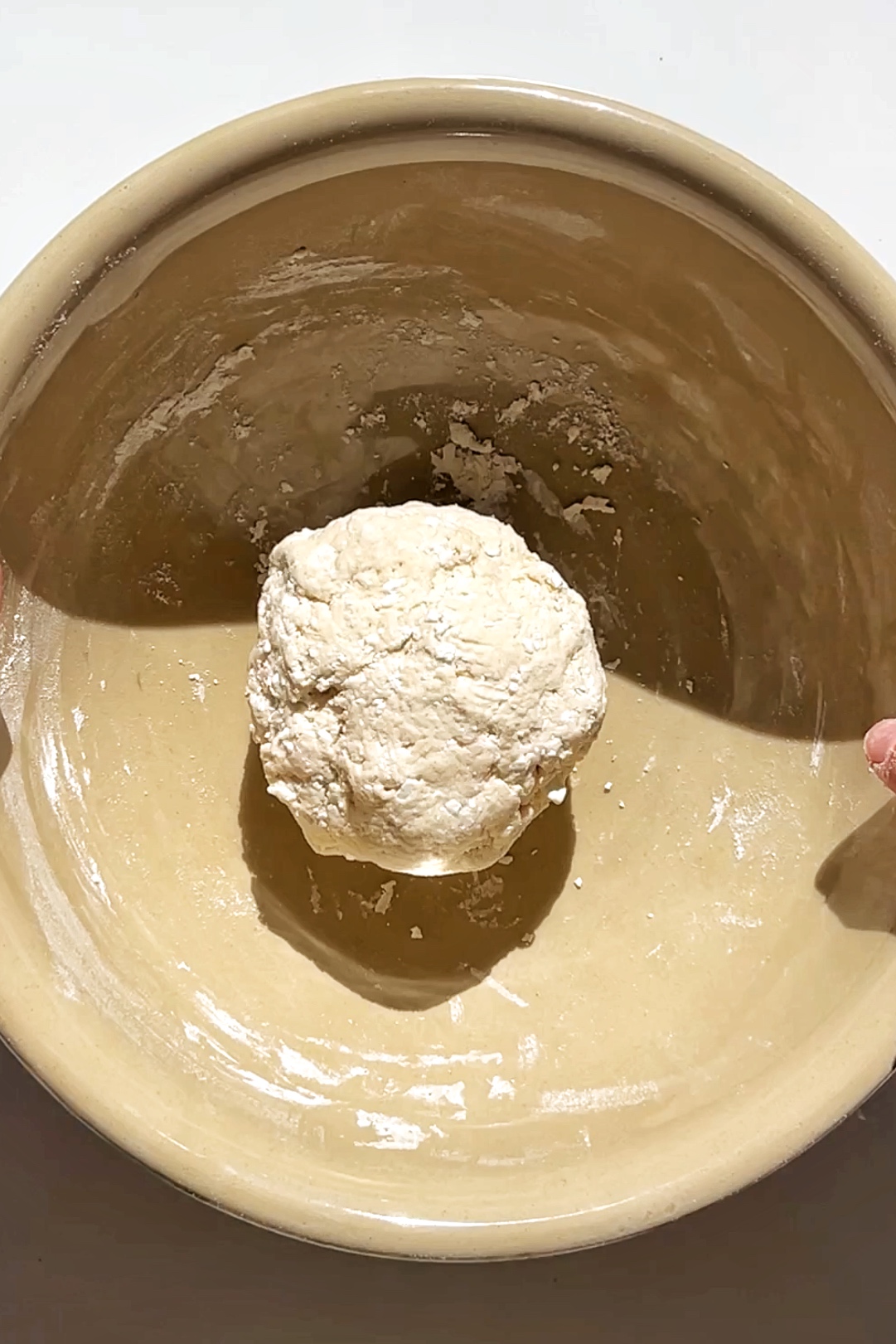 Making pizza dough using self-raising flour and cottage cheese.