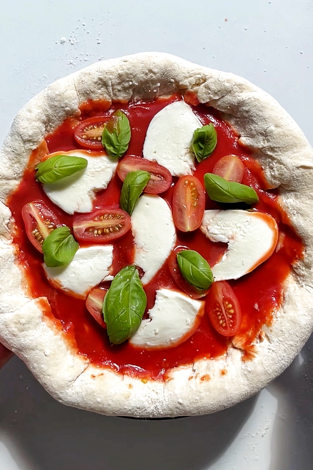 Uncooked homemade pizza.