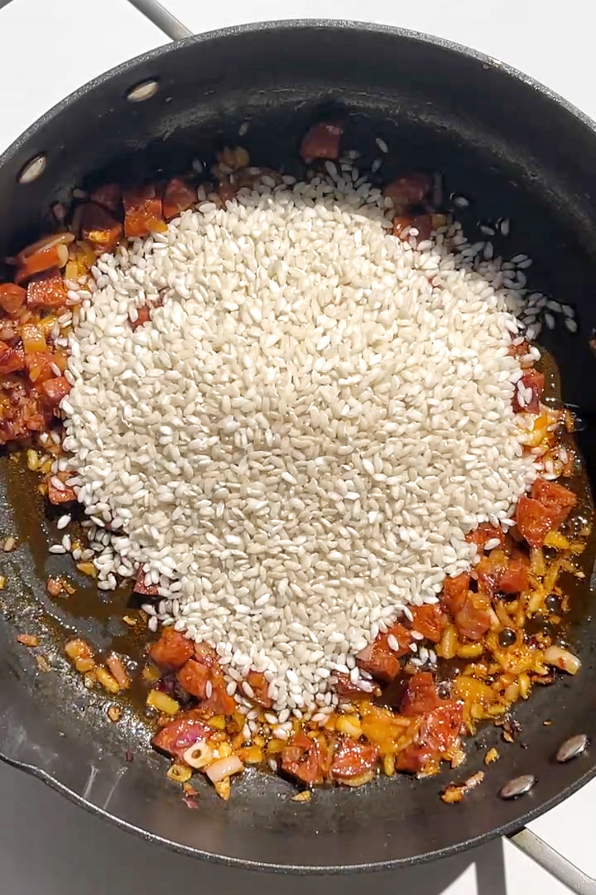 Arborio rice with a chorizo onion and garlic mixture.
