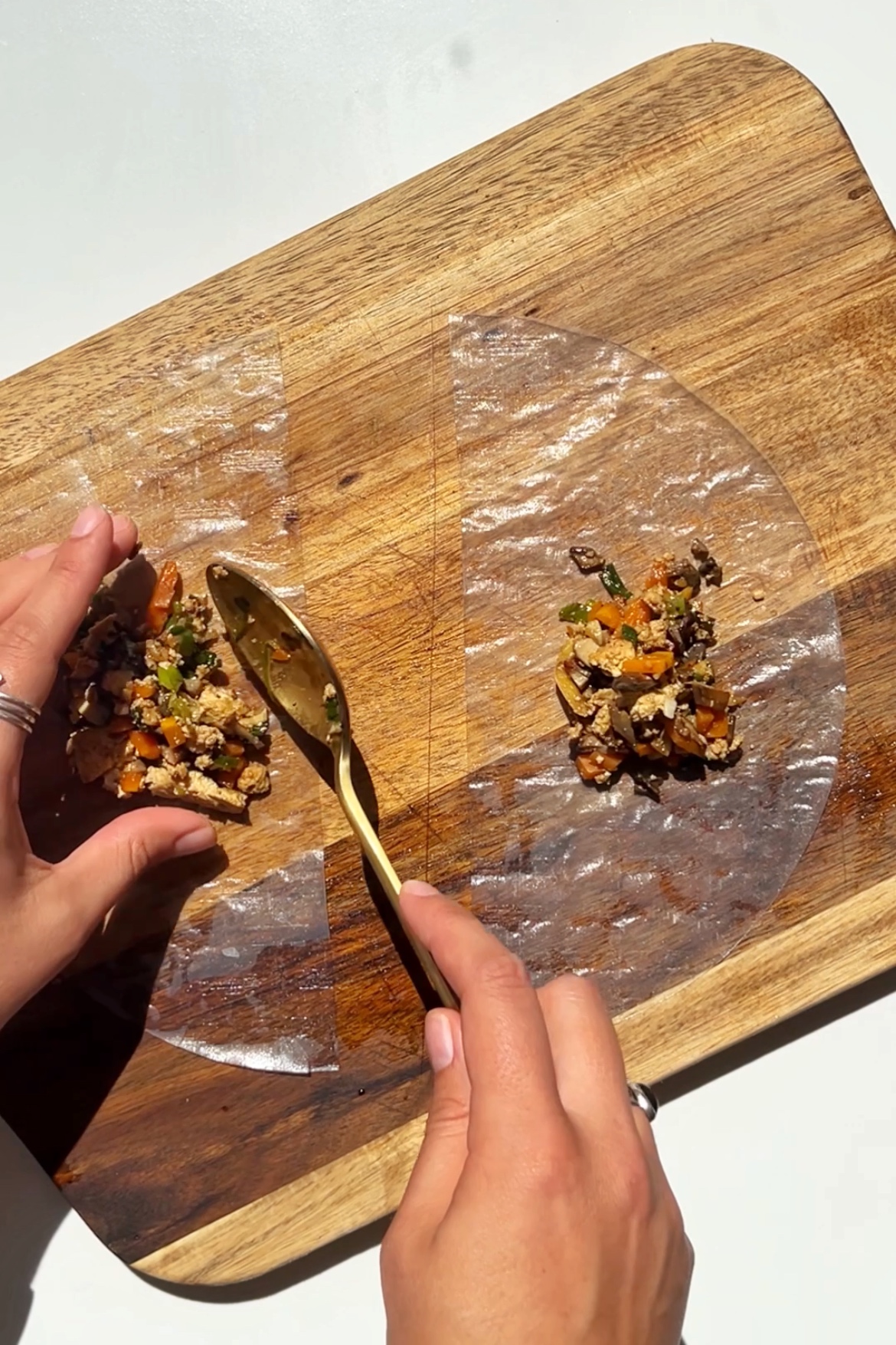 Sliced in half rice paper and filling inside.