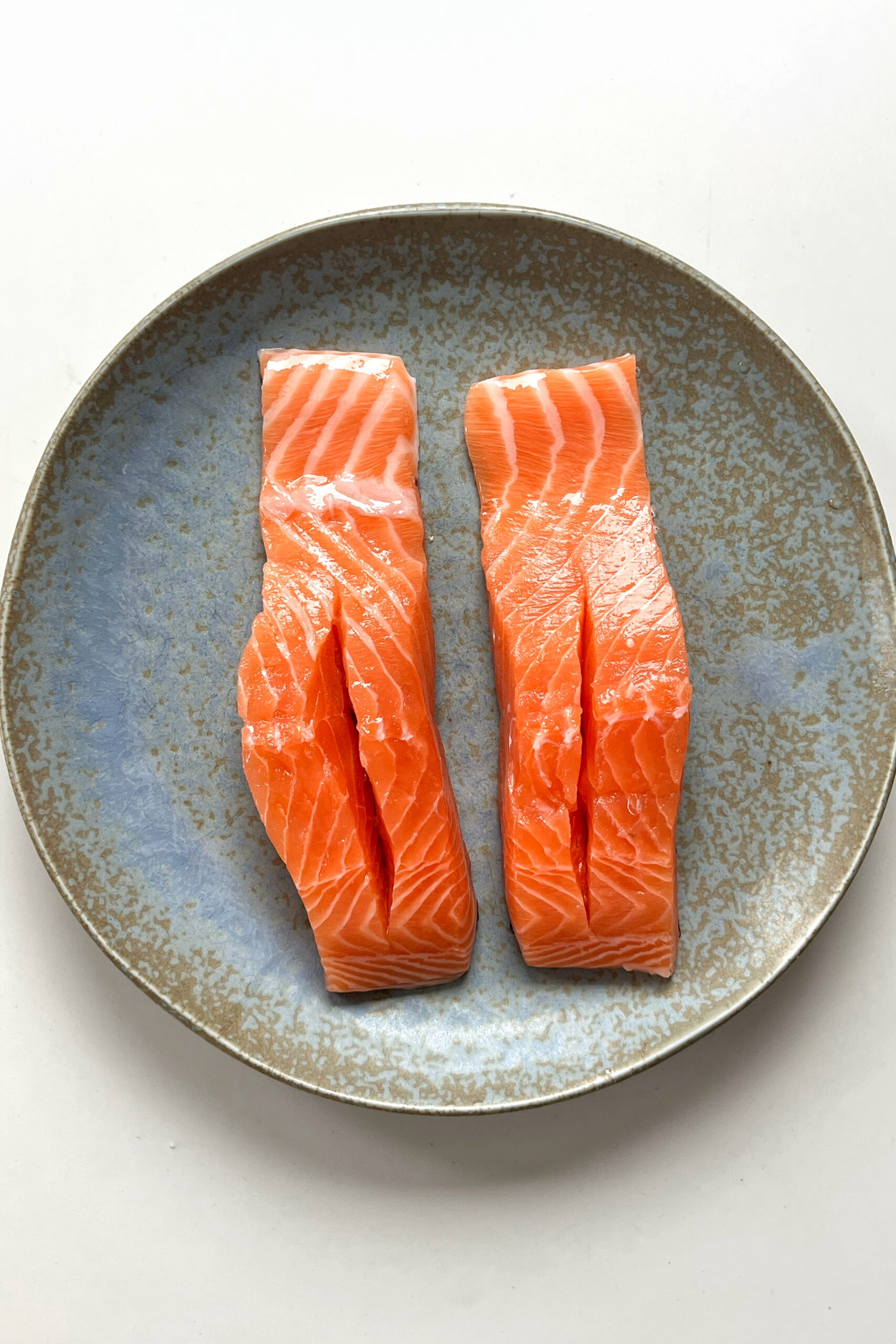 Slicing salmon.