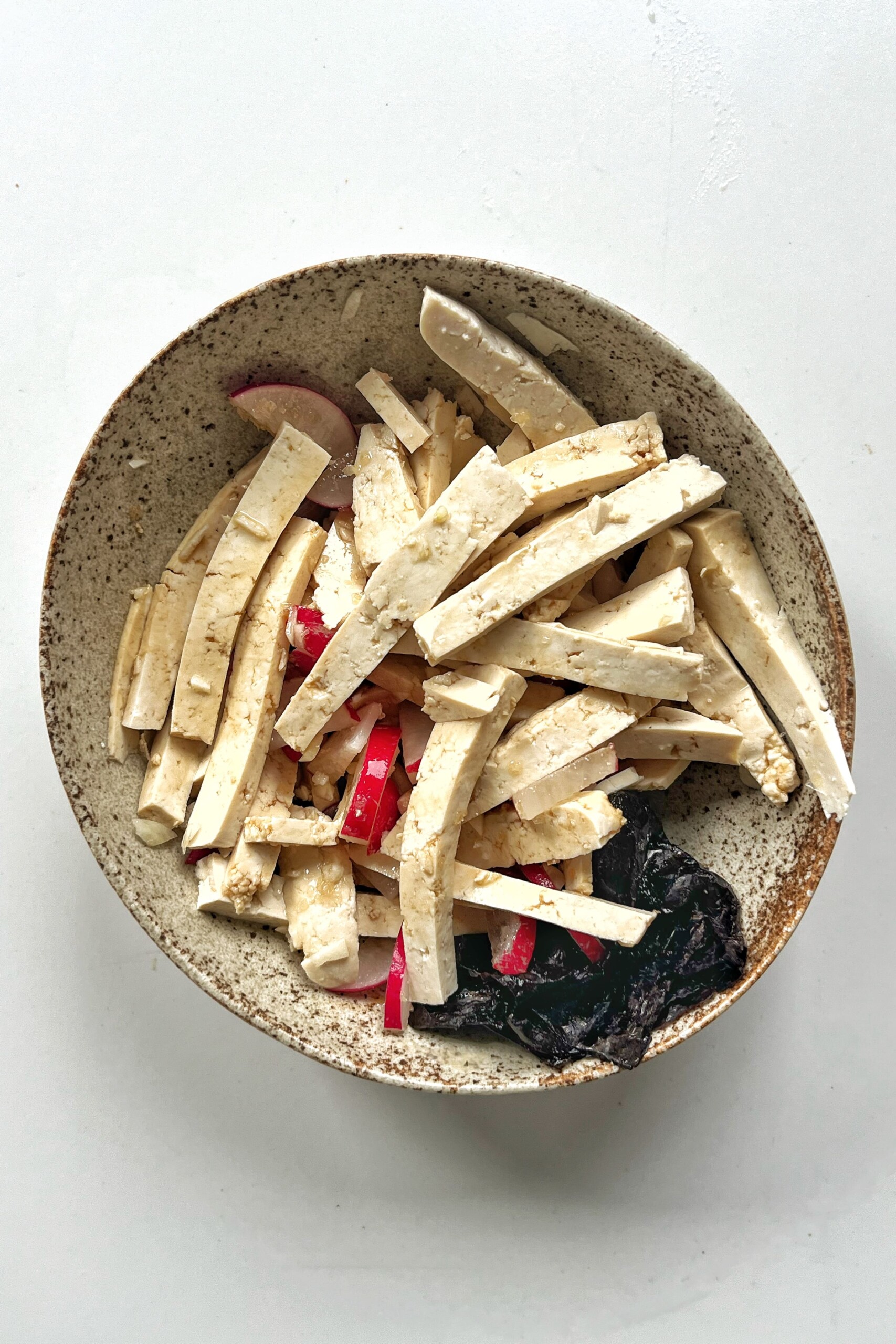 Marinating tofu and radish.