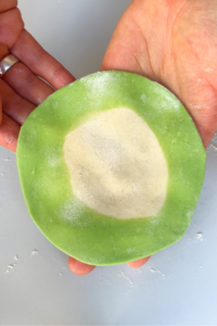 Green and white wrapper for dumplings.