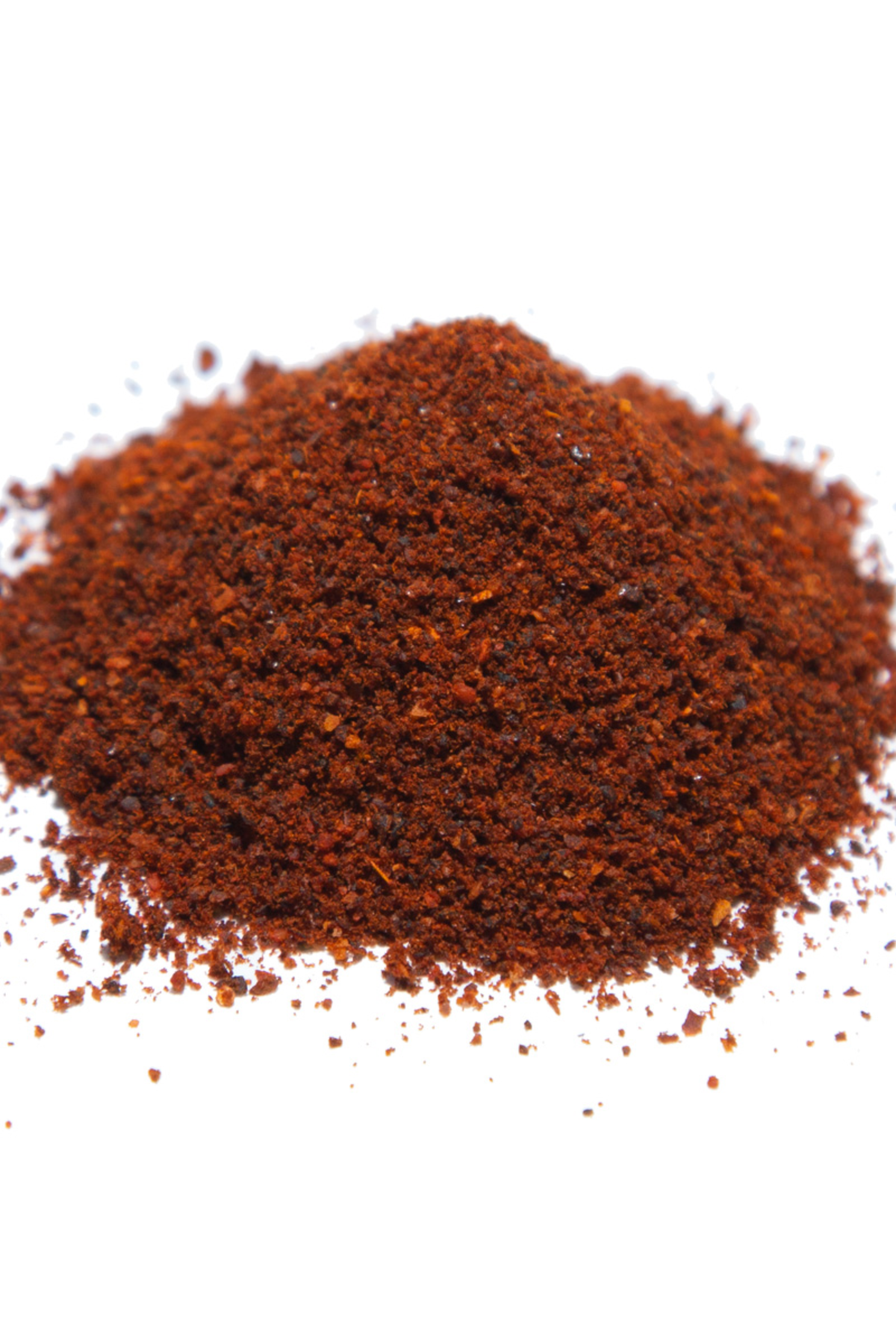 Ancho chilli powder on a white background.