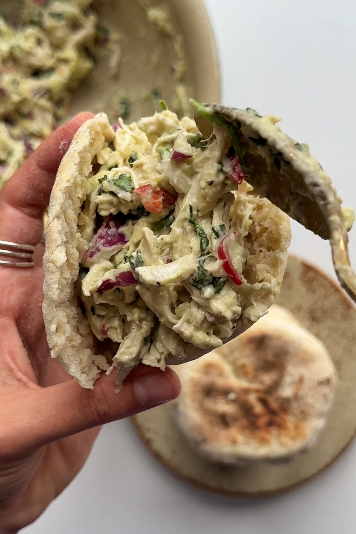 Filling cheat arepas with the Reina pepiada filling.