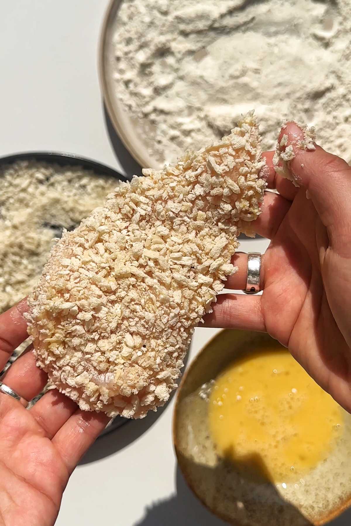 Chicken cutlet covered in panko breadcrumbs.