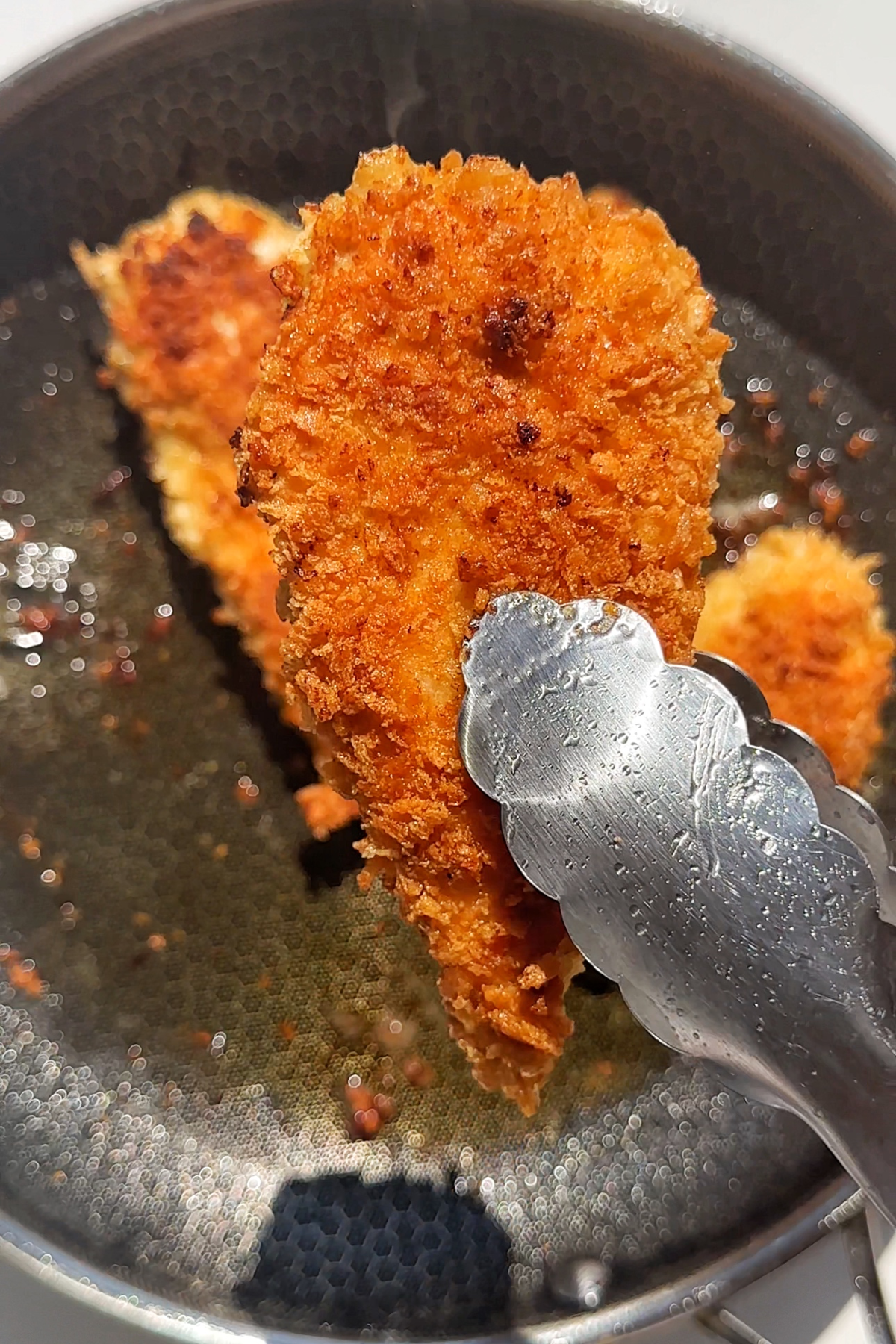 Fried chicken cutlet with panko breadcrumbs.