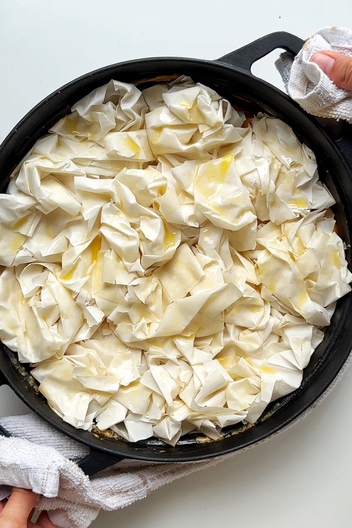 Chorizo prawn and chickpea pie before cooking in the oven.