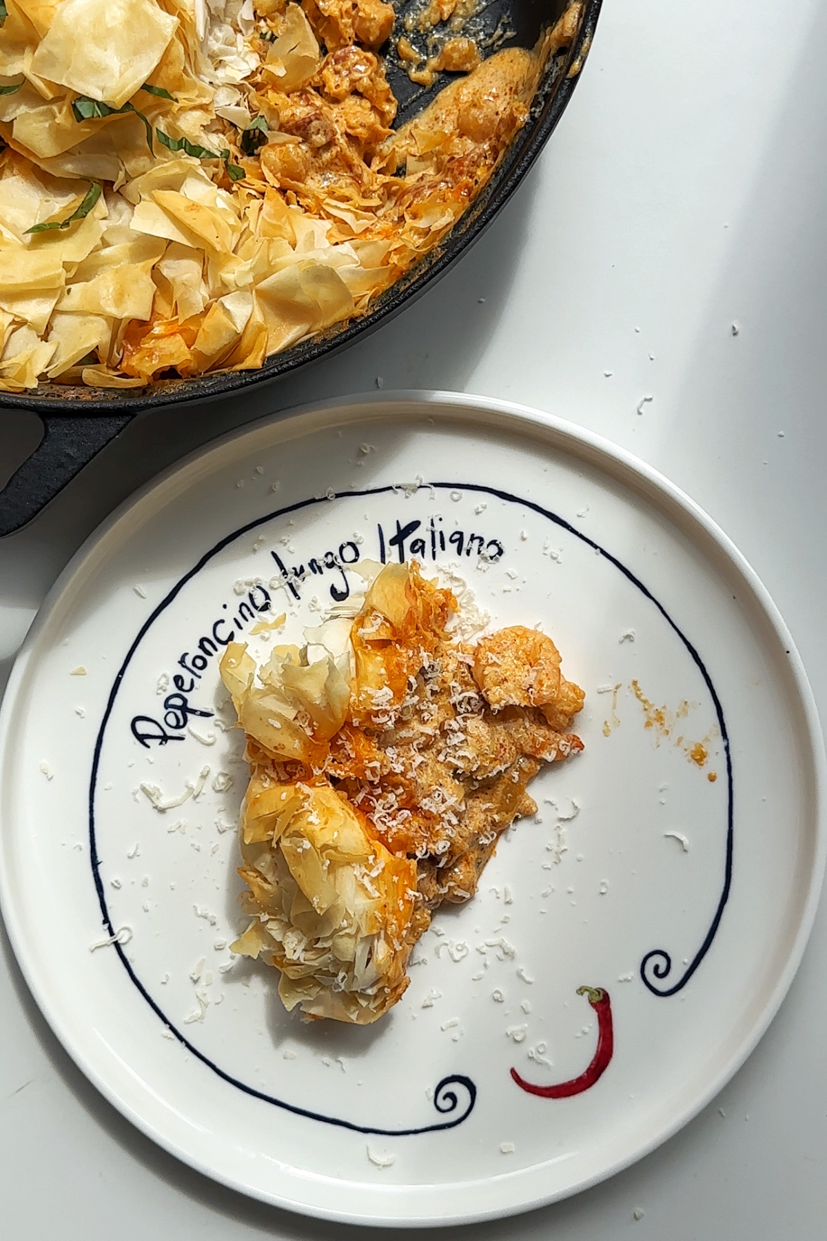 Prawn chorizo and chickpea pie served onto a plate. 