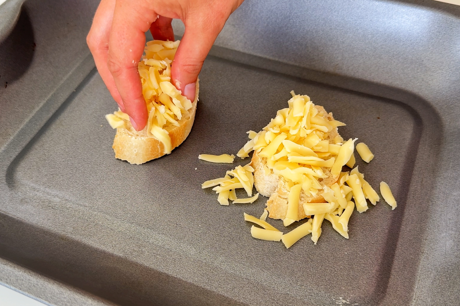 Grilling gouda cheese on bread.