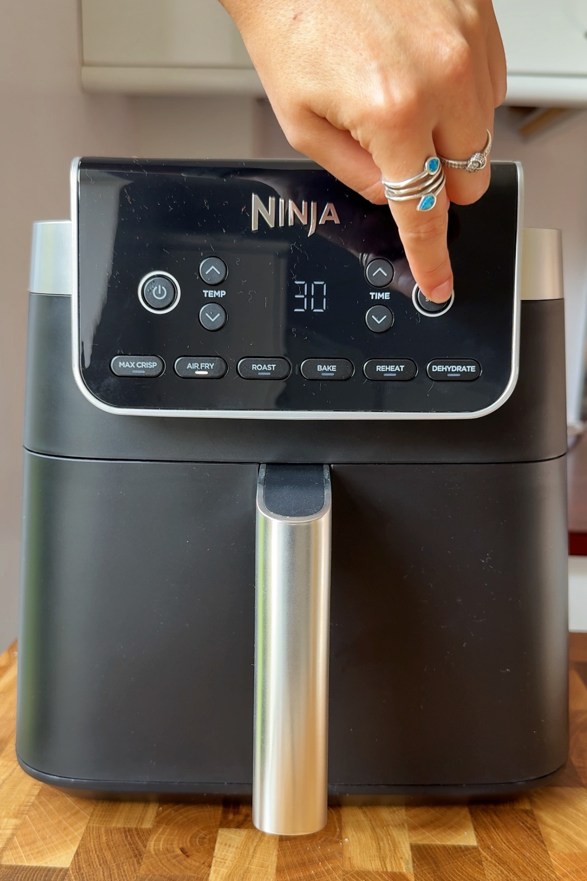 Air fryer ninja cooking pork belly.