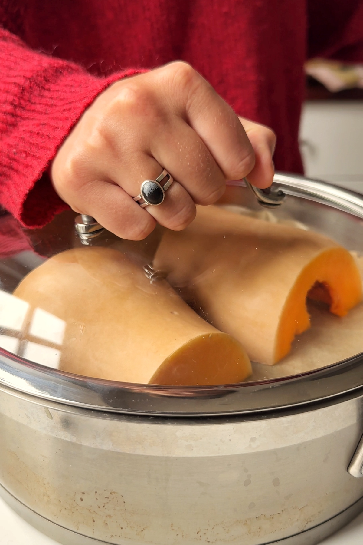 Steaming butternut squash.