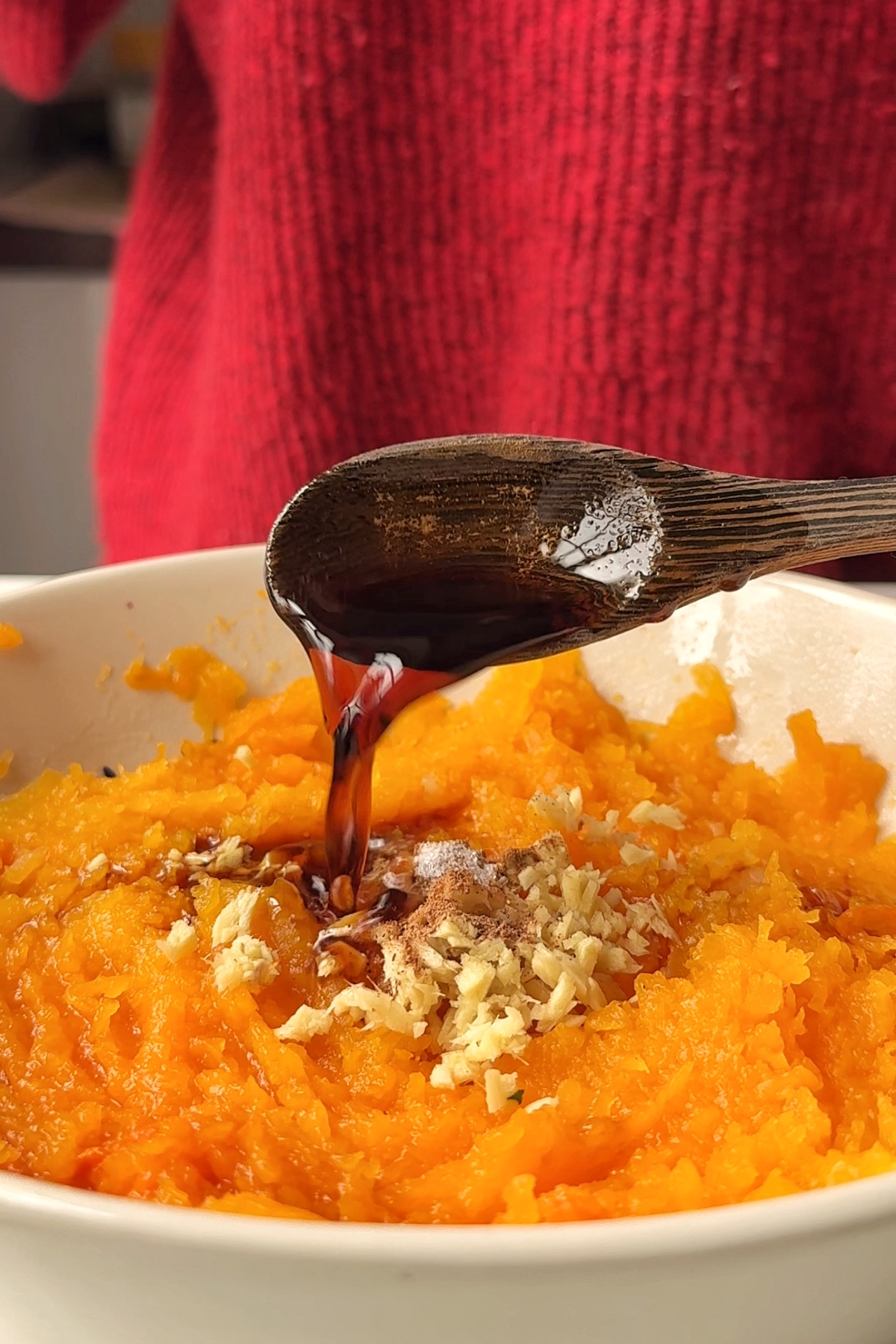 Making the butternut squash sushi sandwich filling.