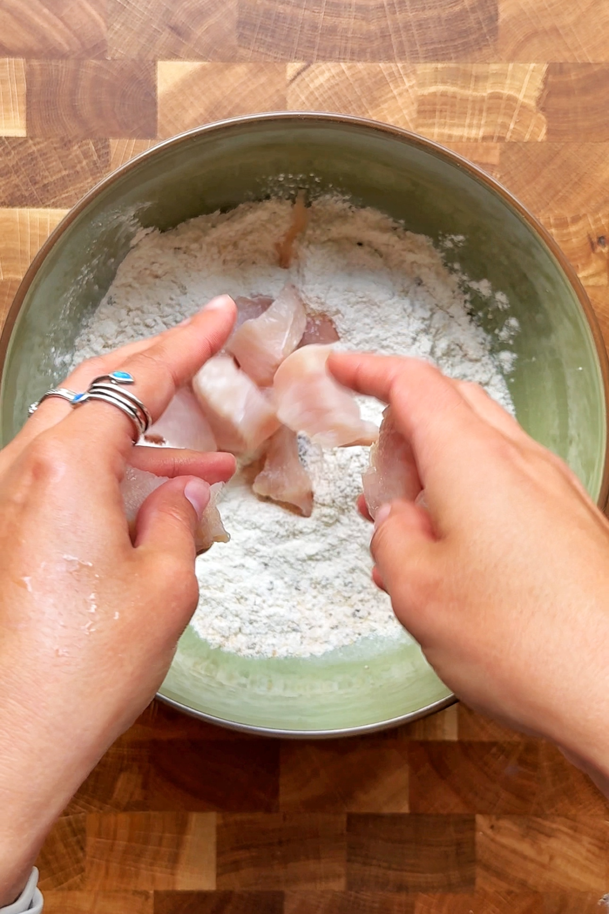 Coat chicken breasts in flour mixture.