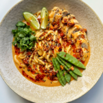 Peanut butter noodles with chicken breast.