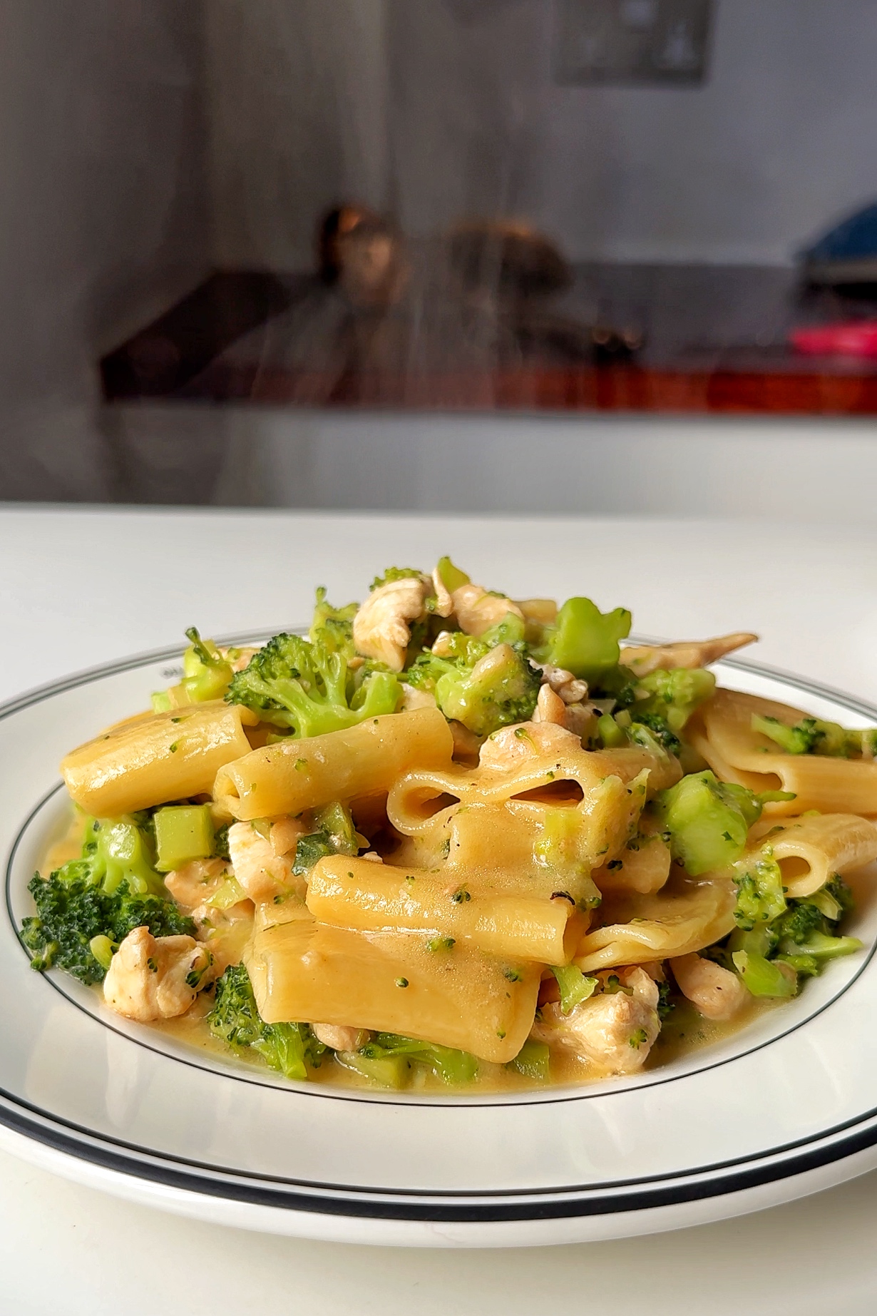Alfredo pasta with broccoli and chicken.