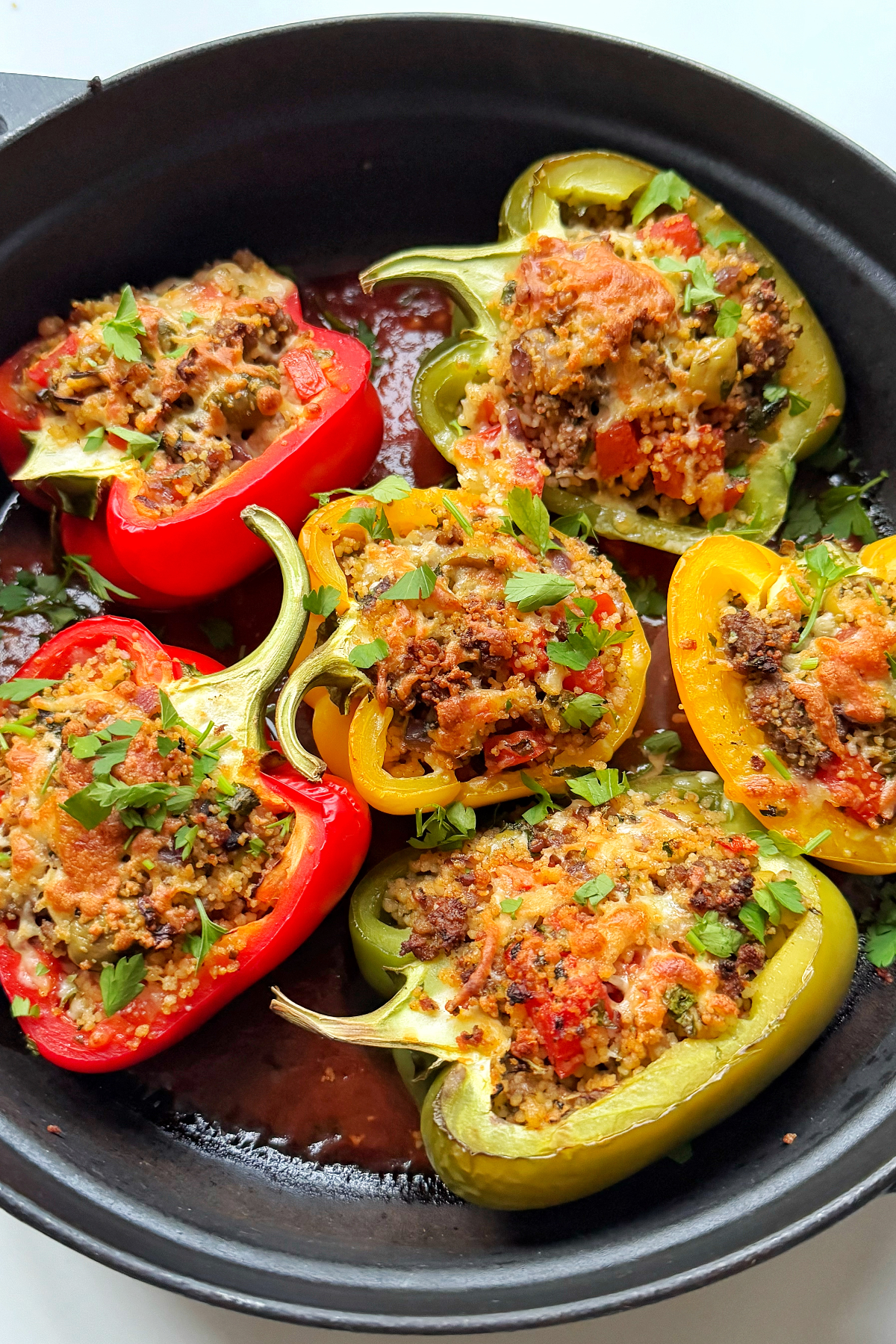 Close up of ground turkey stuffed peppers.