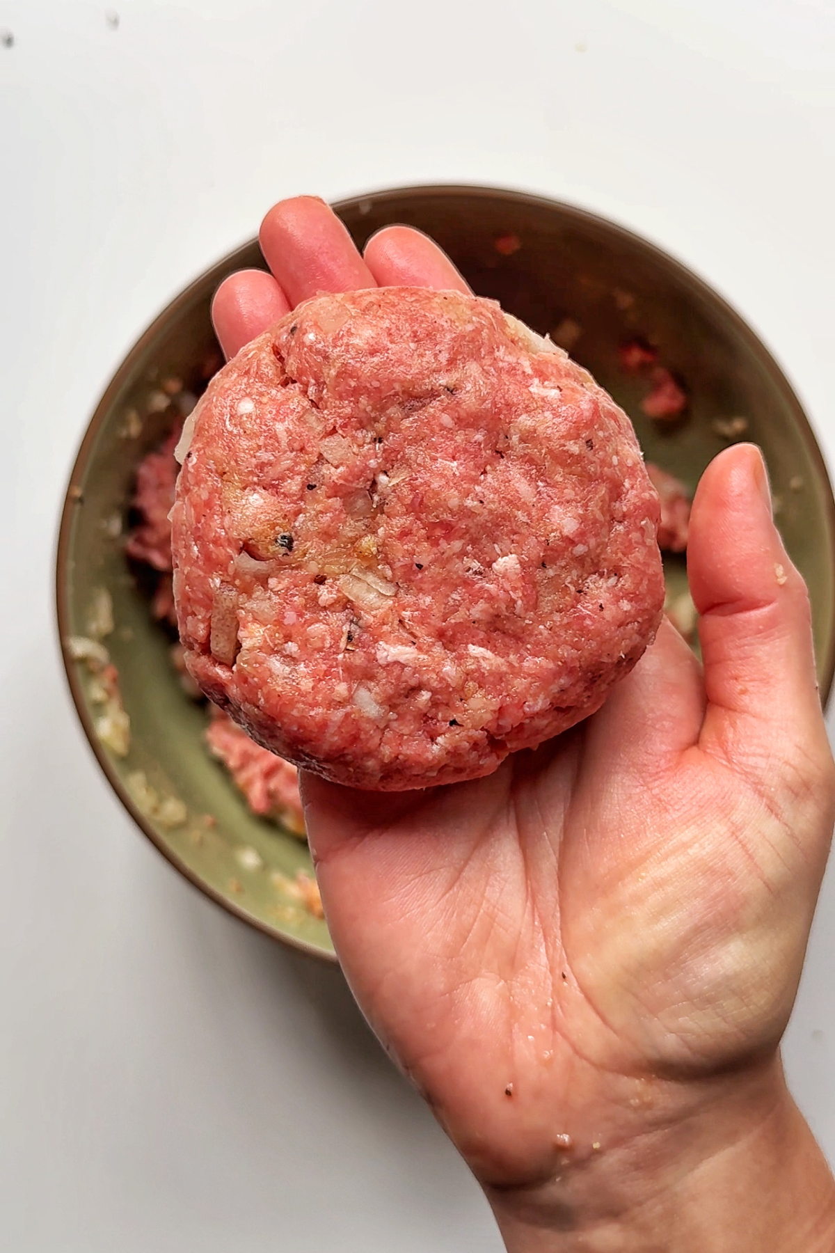 Forming the loco moco patty mixture into patties.