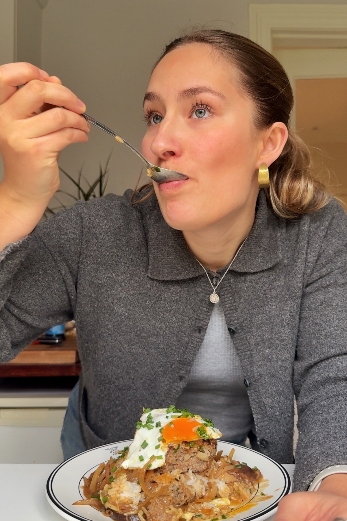 Emily Roz eating loco moco.