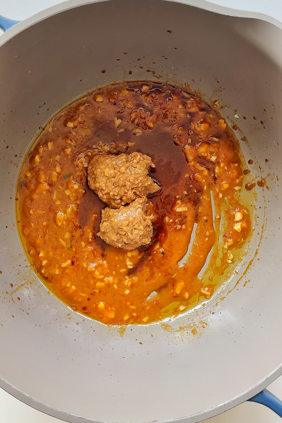 Making the paste for shrimp with noodles.