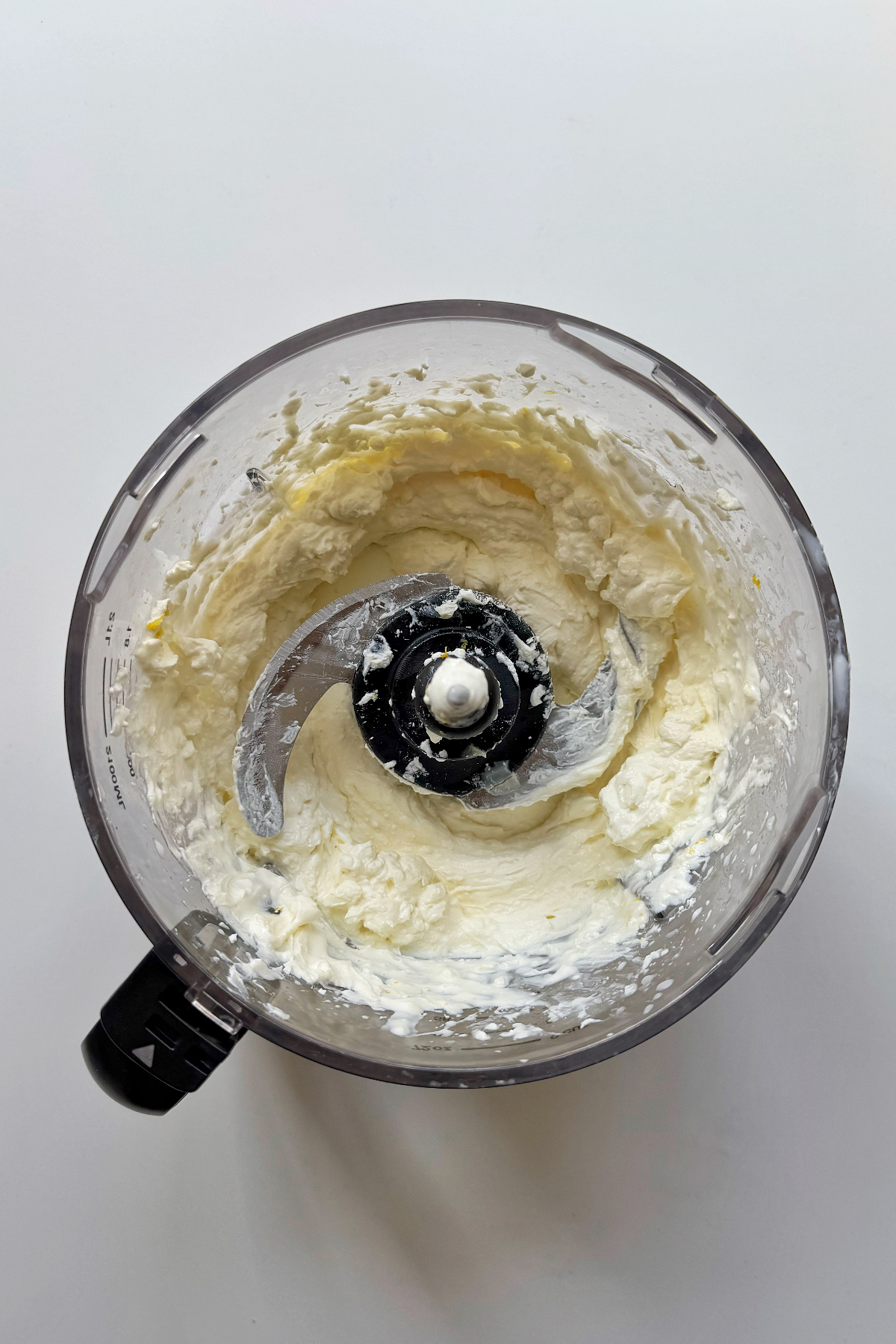 Making the cheesy bruschetta sauce in a food processor.