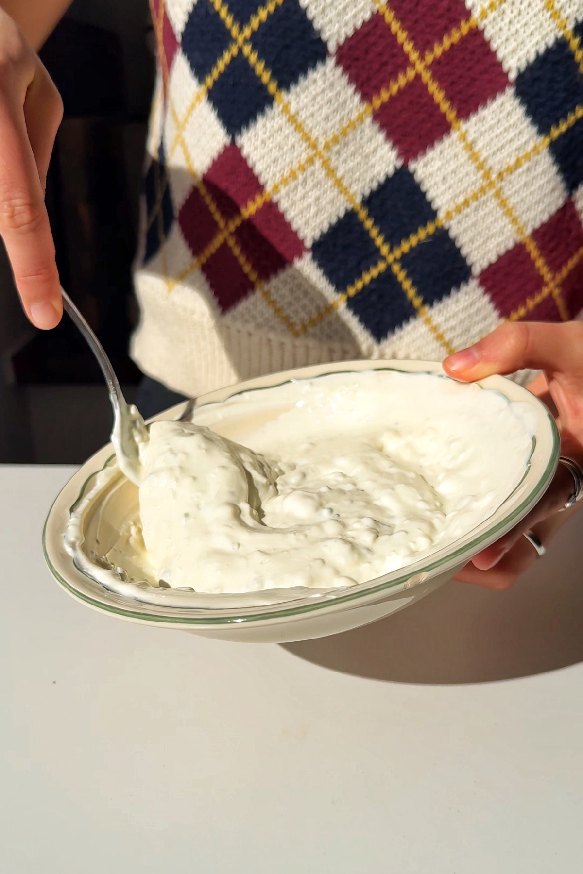 Making the blue cheese sauce.