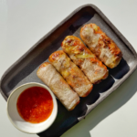 air fryer rice paper rolls with sweet chilli sauce.