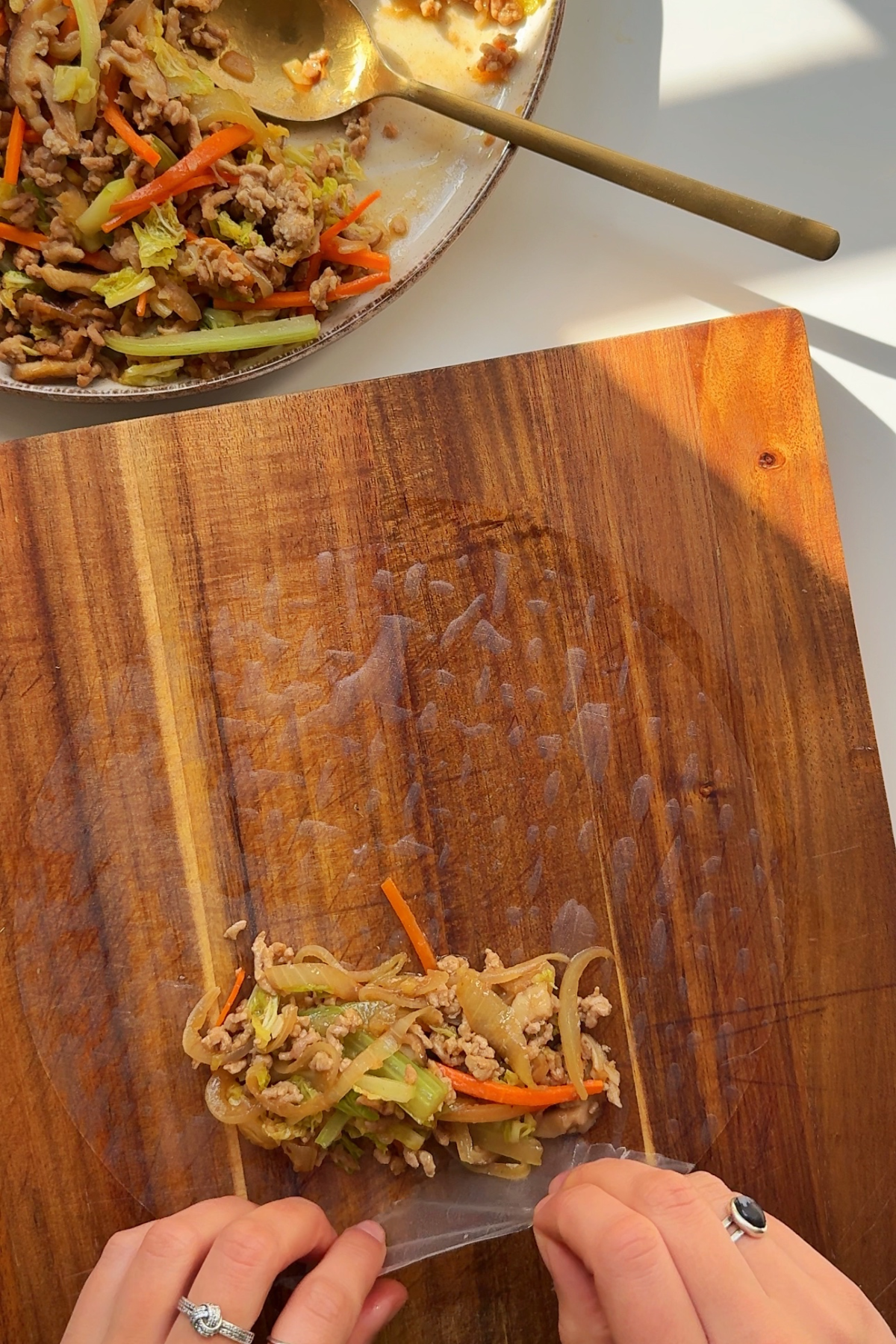 Rolling up rice paper rolls.