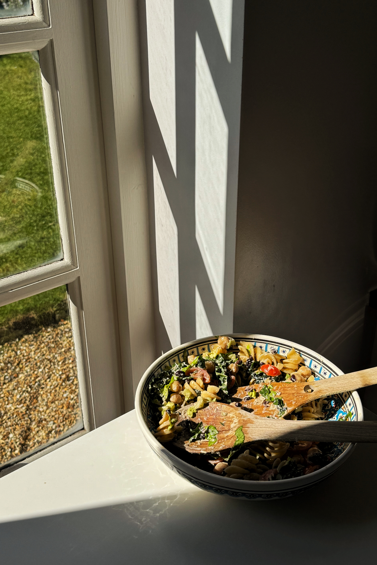 pasta and bean salad in window.