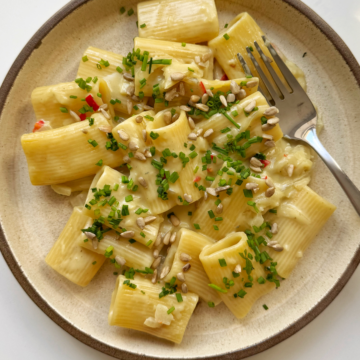 one pan gorgonzola pasta on a plate with a fork.