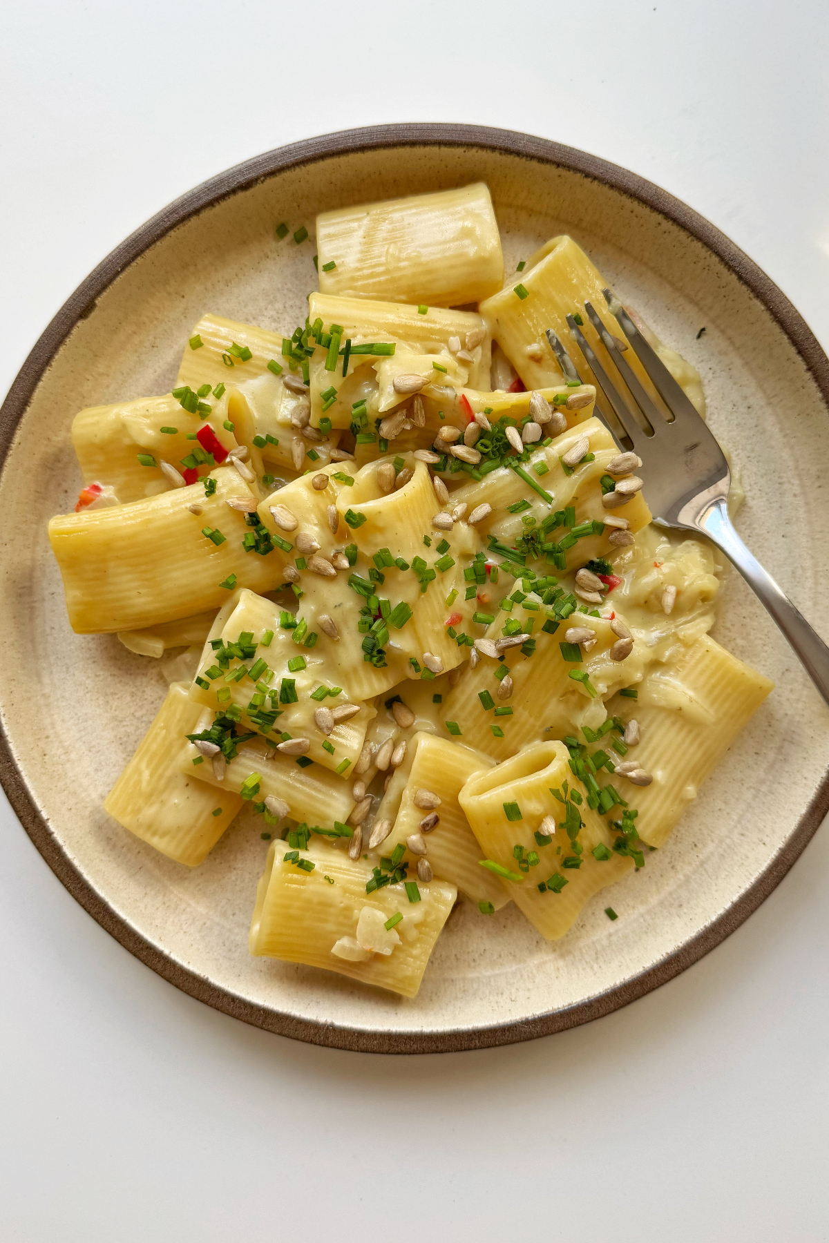 one pan gorgonzola pasta on a plate with a fork. 