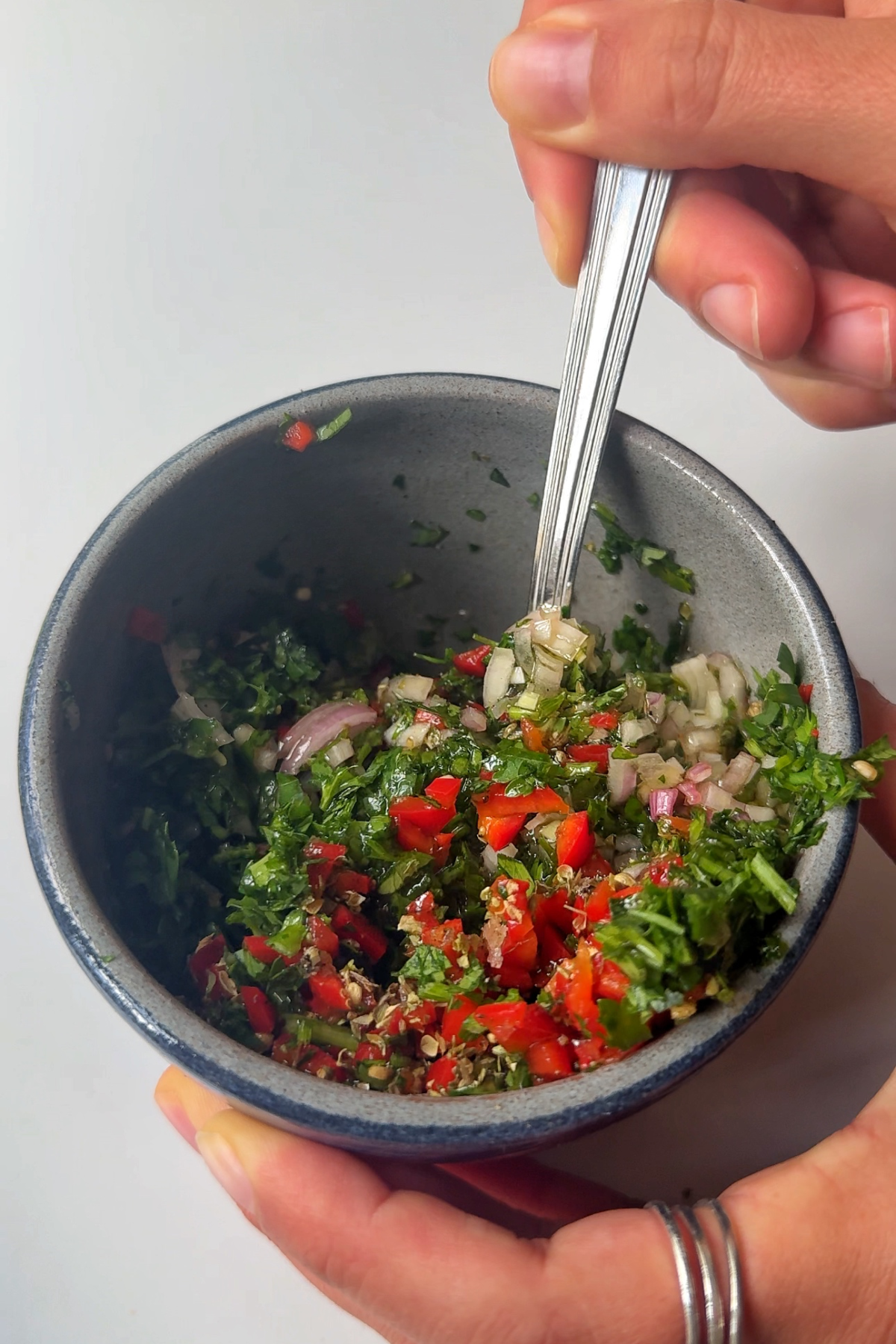 Making homemade chimichurri.