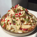 plate of apple fennel salad on plate.