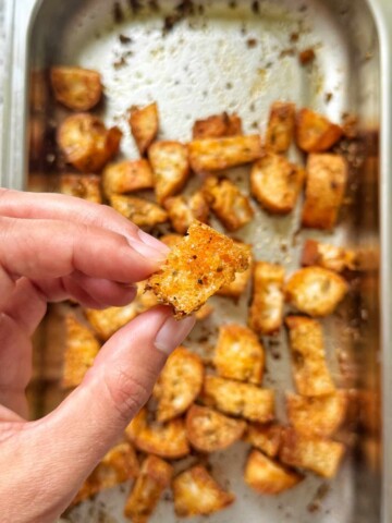 Crunchy croutons in a baking tin.