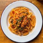 turkey pasta in white bowl.