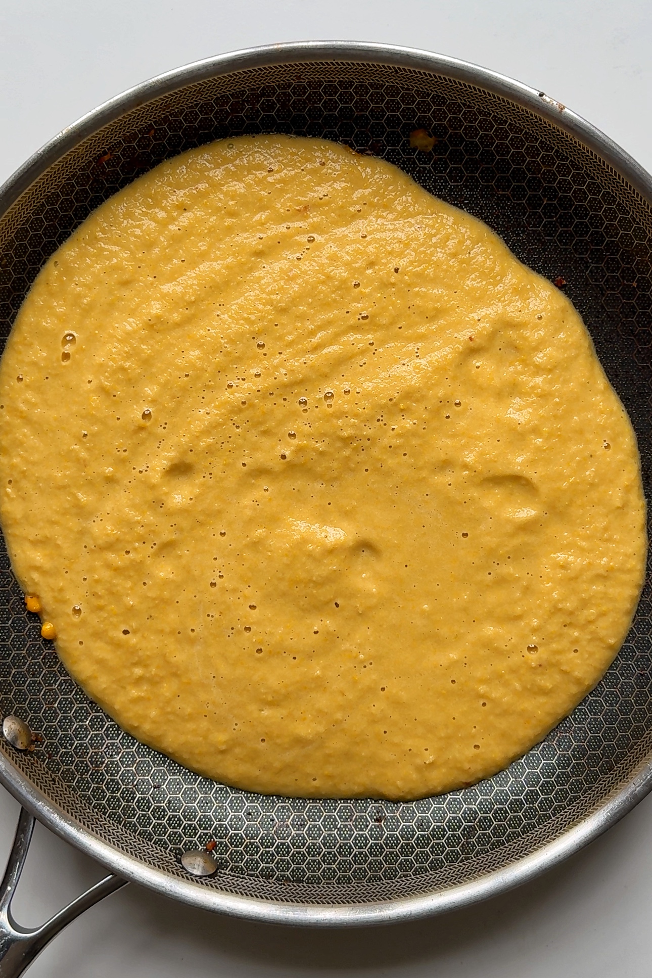 Miso corn sauce in pan.