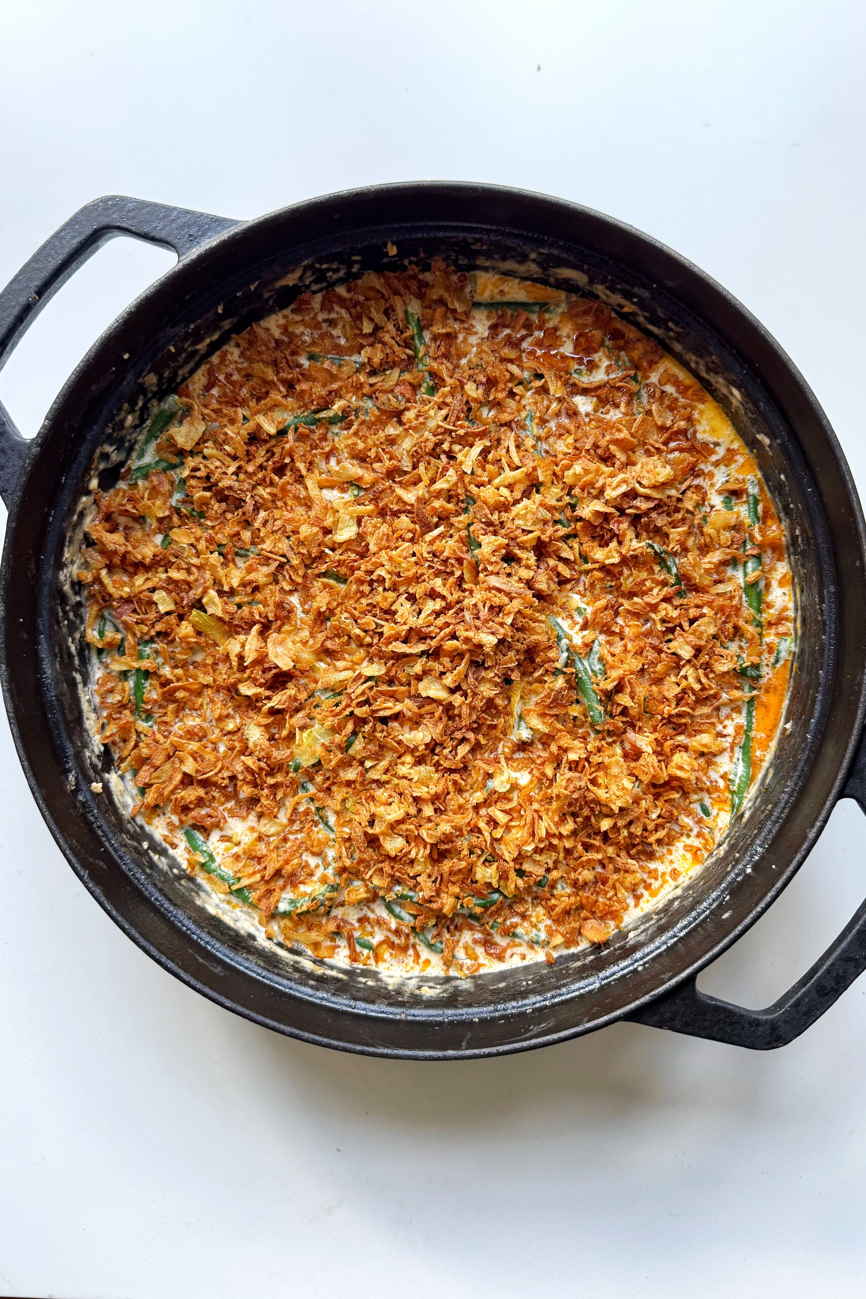 Adding crispy onions on top of green bean casserole without mushrooms.