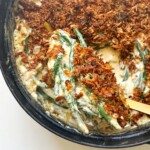 Spooning green bean casserole without mushroom.