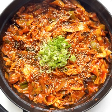 black pan with spicy gochujang lasagne in it.