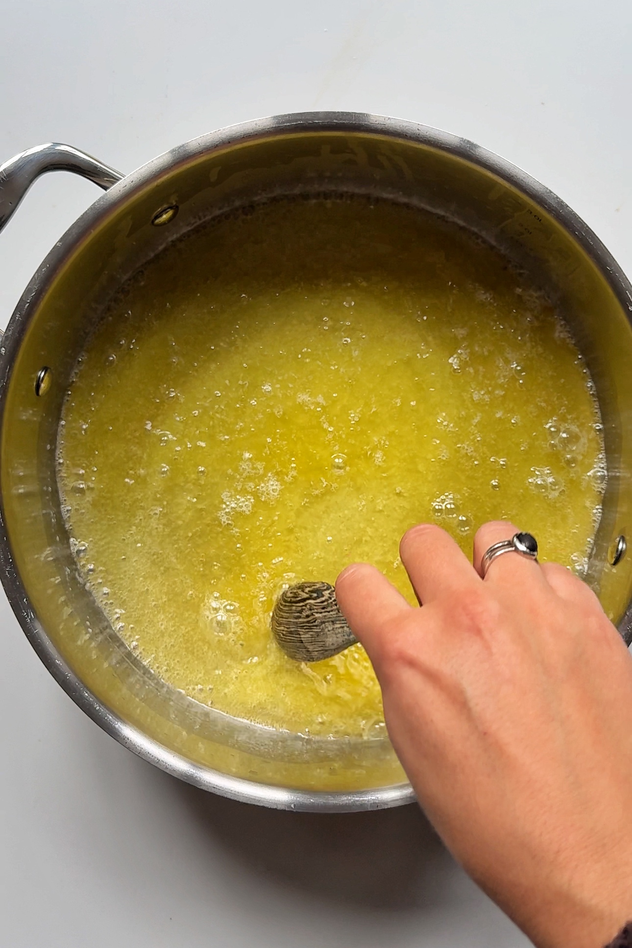 melting butter in a pan.