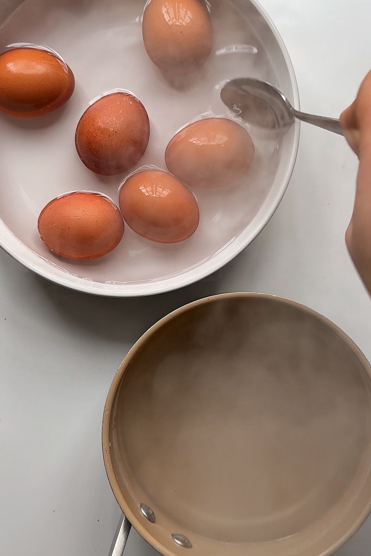 Boiling eggs for egg curry.