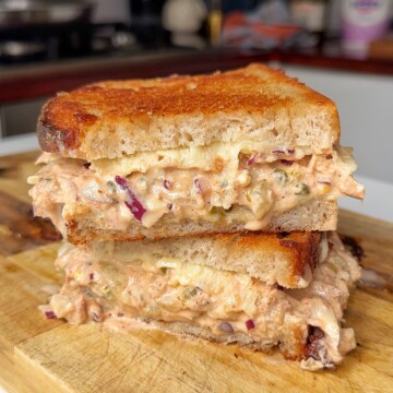 tuna melt on wooden chopping board