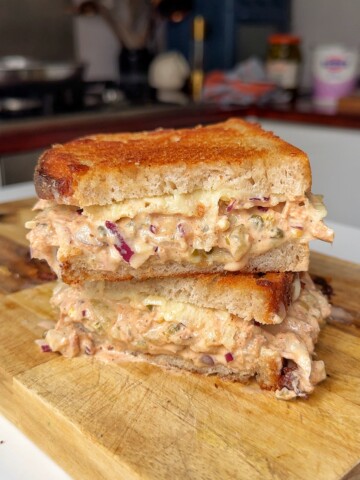 tuna melt on wooden chopping board