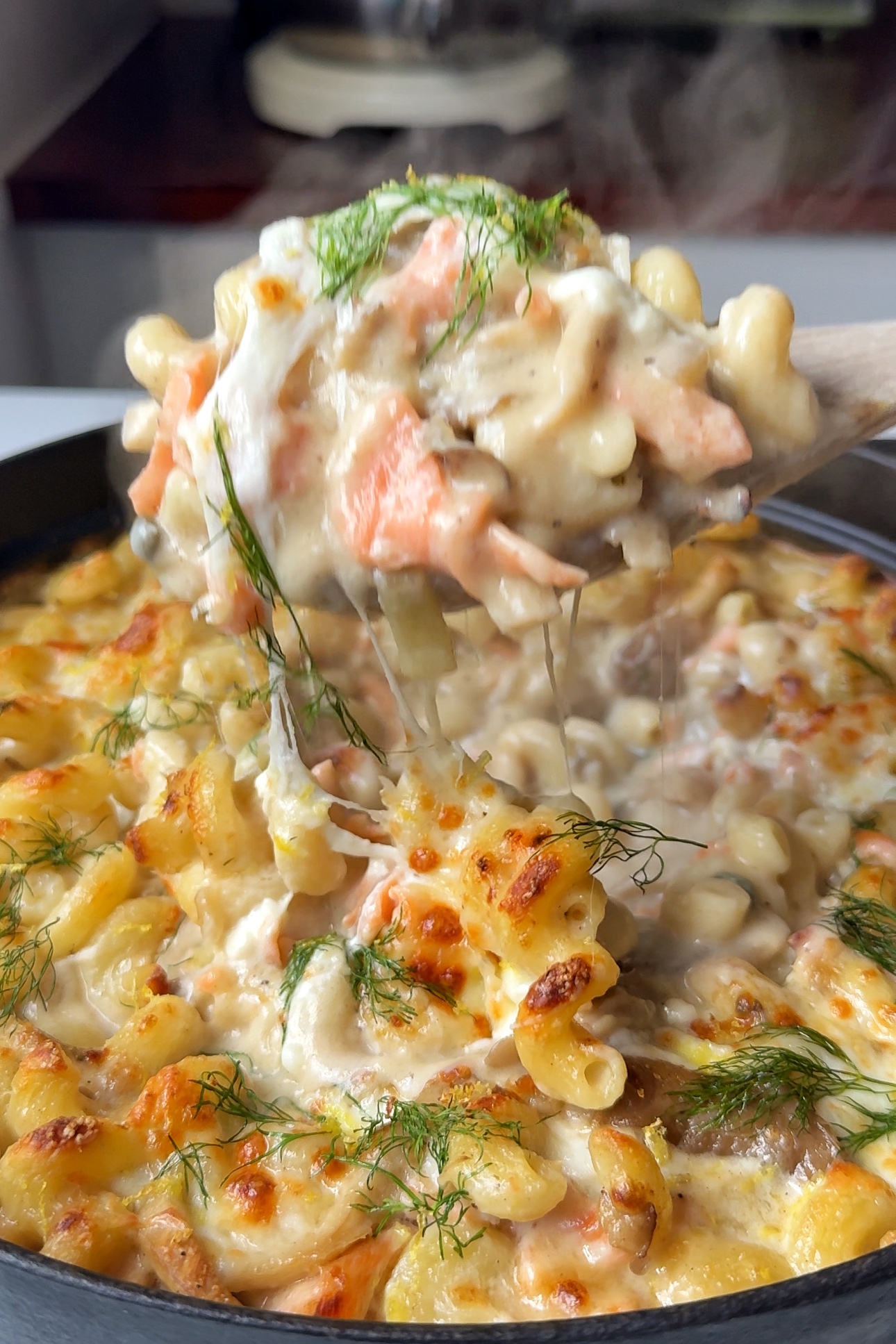 Spoonful of smoked salmon pasta.