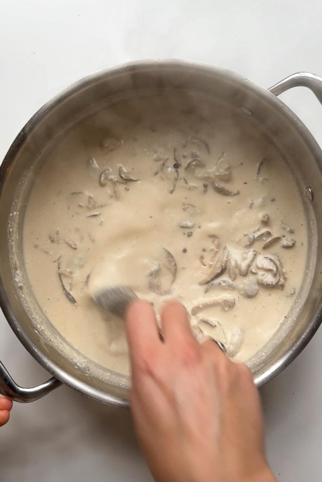 Making the peppercorn and mushroom gravy.