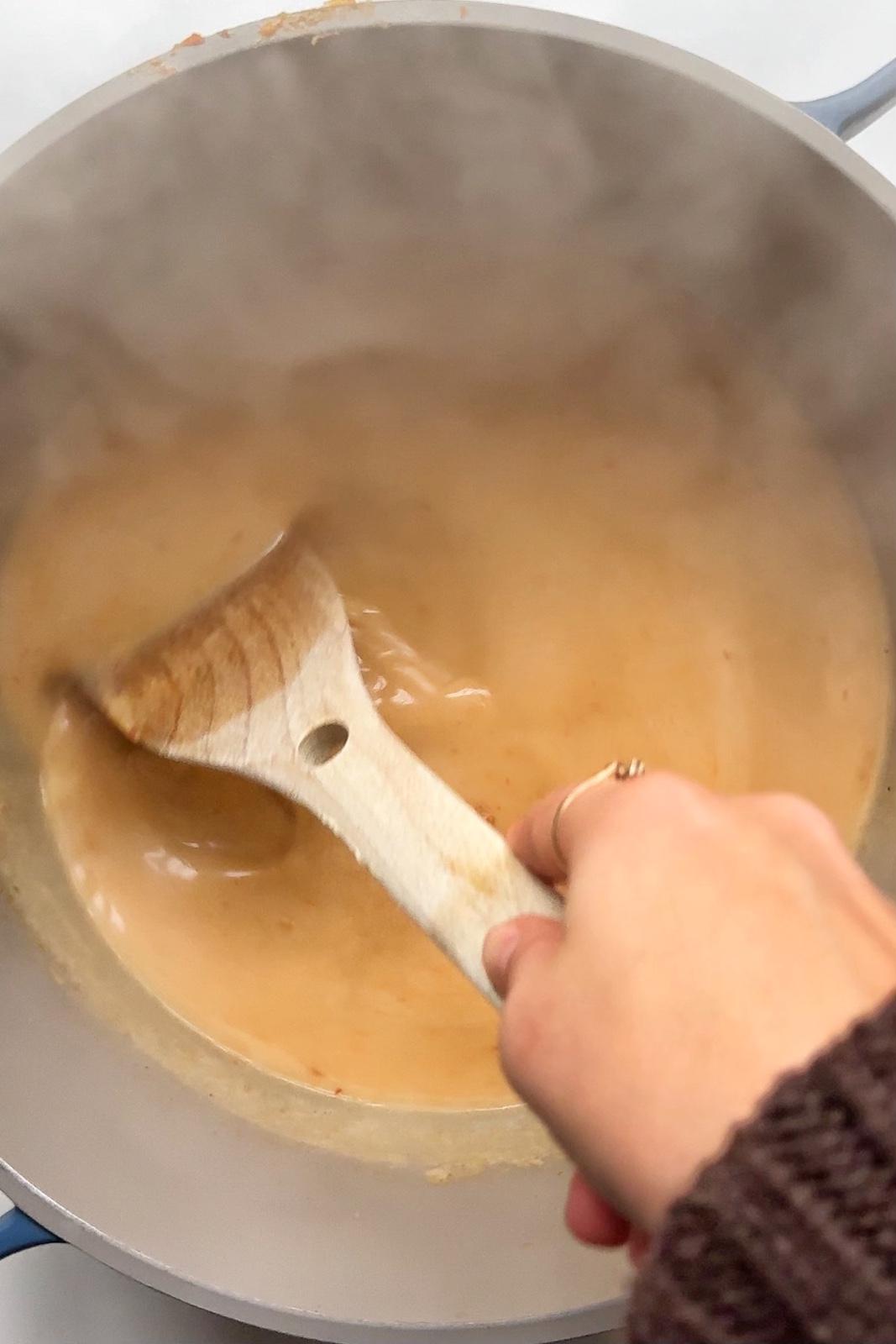 Add in the coconut milk to the chicken katsu ramen sauce.
