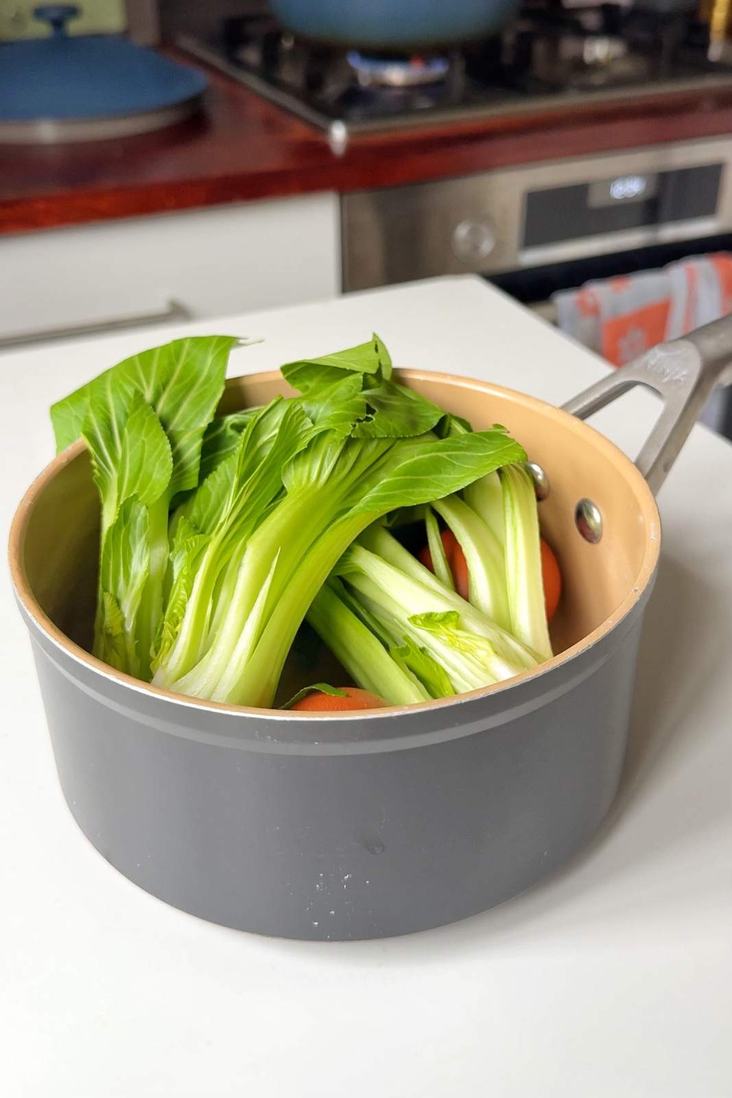 Cook the pak choi and eggs.