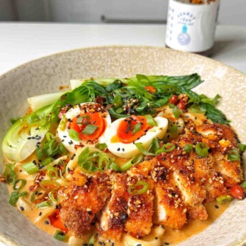 Chicken katsu ramen in a white bowl.